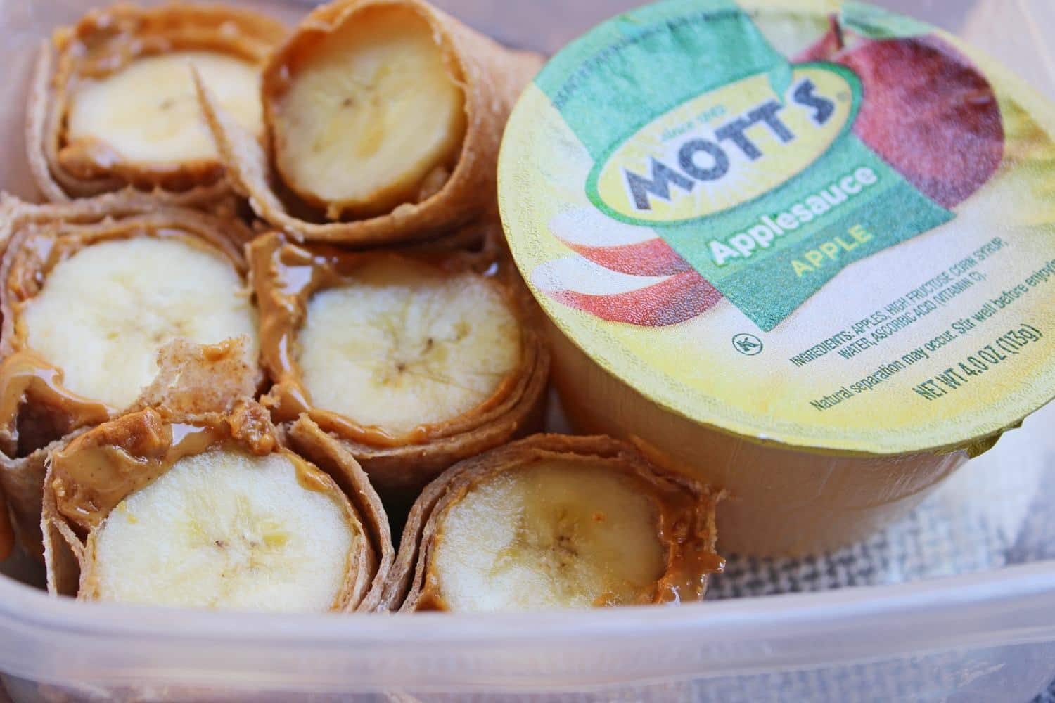 Peanut butter banana roll ups in a tortilla for school lunch How to Keep Picky Eaters Interested in Packed Lunches All Year